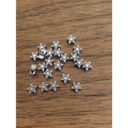 10 stk kl Metallperle Stern, 6x6x3mm, Bohrung 1.5mm, tibetsilber
